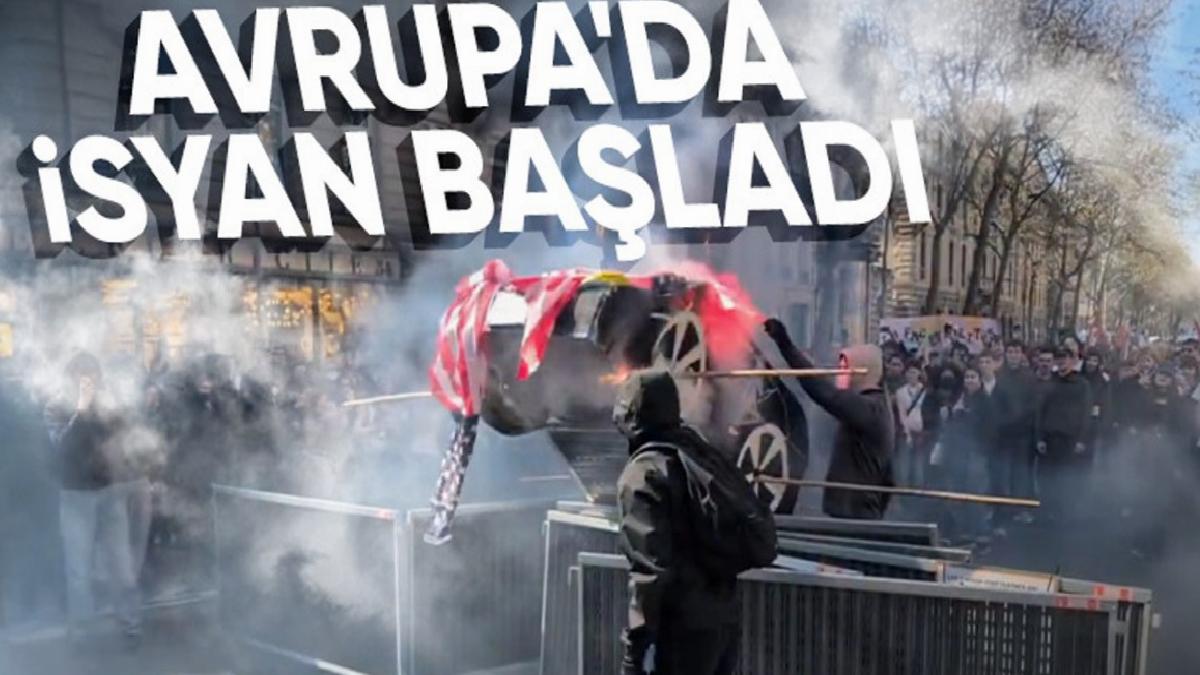 Fransa’da eylem yapan öğrenciler Tesla maketi ve ABD bayrağı yaktı