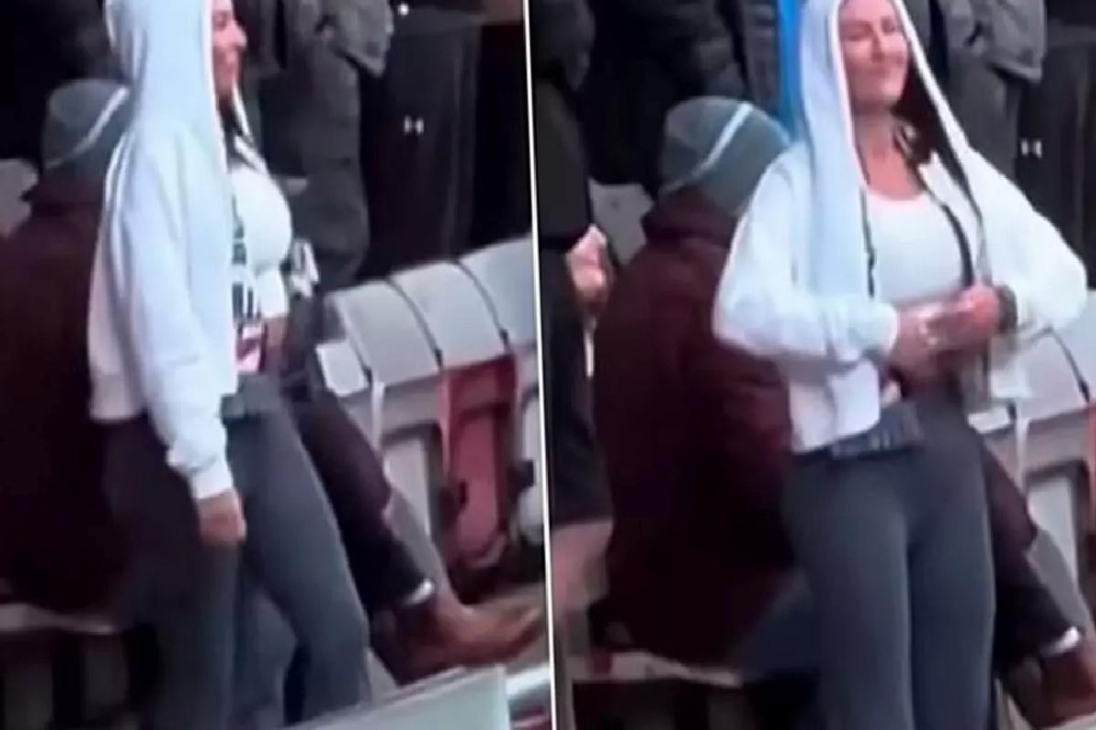 Kadın taraftar, kendisine küfreden rakip takım taraftarlarına göğüslerini göstererek karşılık verdi