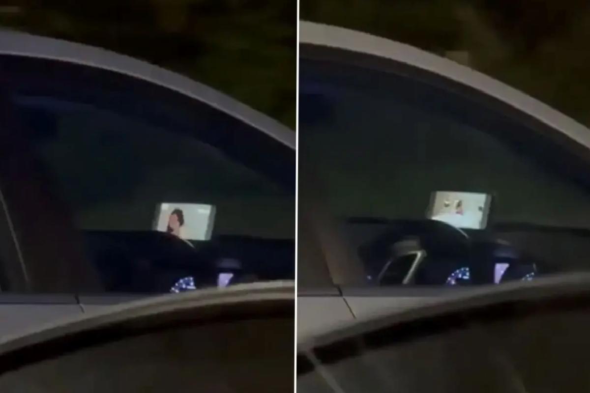 Sürücü kadın, otobanda film izleyerek araç kullanırken görüntülendi